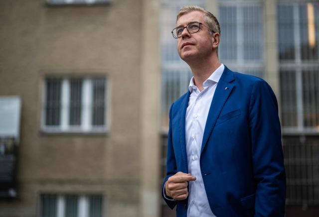 Berlin's senator for culture Stefan Evers visits the former prison of the East German communist-era secret police, known as the Stasi, at Hohenschoenhausen in Berlin on September 16, 2026. The complex, now a museum and memorial, included interrogation and detention facilities as well as underground cells where the regime's critics underwent relentless psychological torture. Evers is the Christian Democratic Union's (CDU) main candidate in upcoming regional elections in Berlin. (Photo by John MACDOUGALL / AFP)
