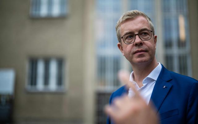 Berlin's senator for culture Stefan Evers visits the former prison of the East German communist-era secret police, known as the Stasi, at Hohenschoenhausen in Berlin on September 16, 2026. The complex, now a museum and memorial, included interrogation and detention facilities as well as underground cells where the regime's critics underwent relentless psychological torture. Evers is the Christian Democratic Union's (CDU) main candidate in upcoming regional elections in Berlin. (Photo by John MACDOUGALL / AFP)