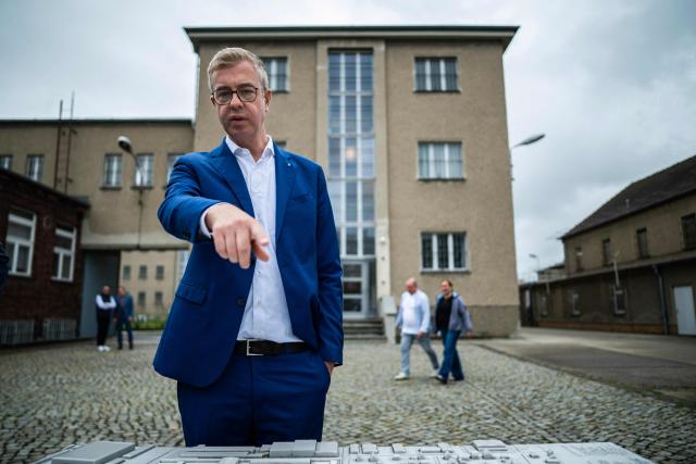 Berlin's senator for culture Stefan Evers visits the former prison of the East German communist-era secret police, known as the Stasi, at Hohenschoenhausen in Berlin on September 16, 2026. The complex, now a museum and memorial, included interrogation and detention facilities as well as underground cells where the regime's critics underwent relentless psychological torture. Evers is the Christian Democratic Union's (CDU) main candidate in upcoming regional elections in Berlin. (Photo by John MACDOUGALL / AFP)