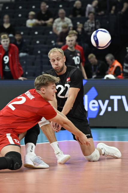 Denmark's Jonas Enemark Petersen and Oskar Kjersterin Madsen play the ball during the men's EuroVolley 2026 Pool C match Denmark vs Serbia in Tampere, on September 16, 2026. (Photo by Emmi Korhonen / Lehtikuva / AFP) / Finland OUT