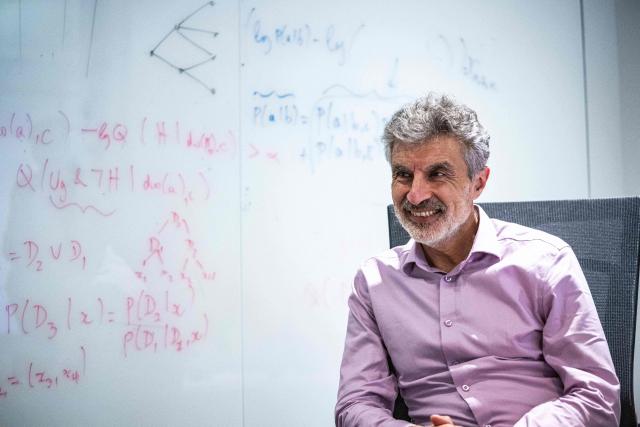 Canadian computer scientist Yoshua Bengio speaks during an interview with AFP in the offices of Law Zero in Montreal, Quebec, on September 15, 2026. Bengio, considered one of the founders of AI, told AFP that humanity is "losing control" of the technology and the world needs guardrails similar to nuclear arms controls. (Photo by ANDREJ IVANOV / AFP)