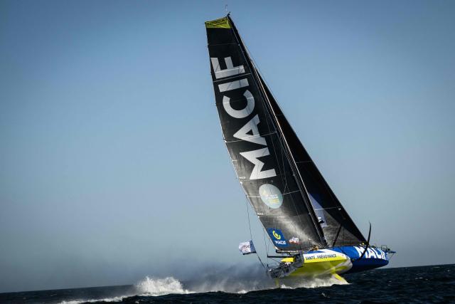 British skipper Sam Goodchild sails his Macif Imoca monohull to win the Run event of the Defi Azimut, a few weeks ahead of the Route du Rhum solo sailing race, off Lorient on September 16, 2026. (Photo by Loic VENANCE / AFP)