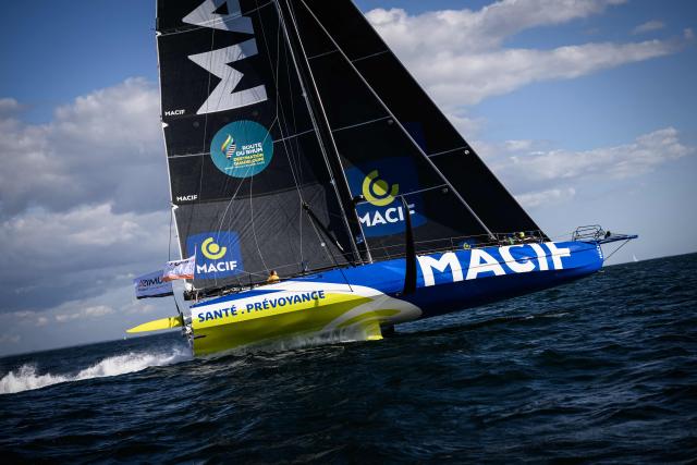 British skipper Sam Goodchild sails his Macif Imoca monohull to win the Run event of the Defi Azimut, a few weeks ahead of the Route du Rhum solo sailing race, off Lorient on September 16, 2026. (Photo by Loic VENANCE / AFP)