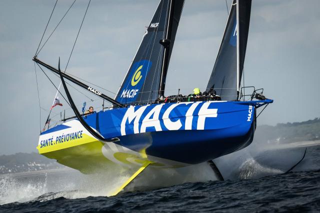 British skipper Sam Goodchild sails his Macif Imoca monohull to win the Run event of the Defi Azimut, a few weeks ahead of the Route du Rhum solo sailing race, off Lorient on September 16, 2026. (Photo by Loic VENANCE / AFP)