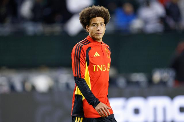 (FILES) Belgium's midfielder #06 Axel Witsel warms up before a friendly football match between Mexico and Belgium at Soldier Field in Chicago, Illinois, on March 31, 2026. OGC Nice's Belgian midfielder Axel Witsel, the second-most-capped player for the Red Devils, announced his retirement from international football on September 16, 2026 at the age of 37. (Photo by KAMIL KRZACZYNSKI / AFP)