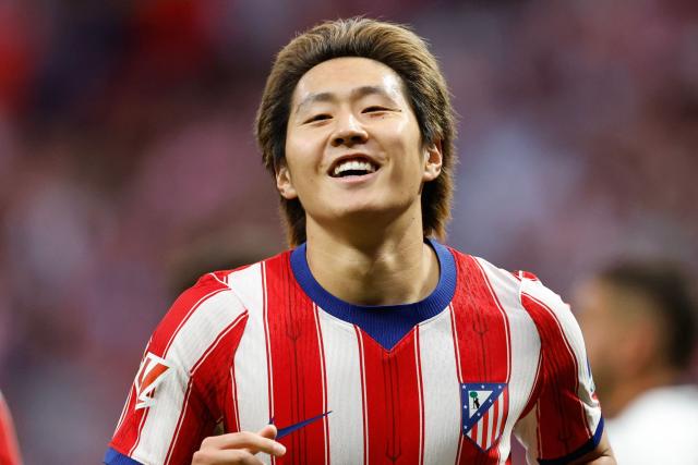 Atletico Madrid's South Korean midfielder #07 Kang-In Lee celebrates scoring his team's second goal during the Spanish league football match between Club Atletico de Madrid and CA Osasuna at the Metropolitano stadium in Madrid on September 16, 2026. (Photo by Oscar DEL POZO / AFP)