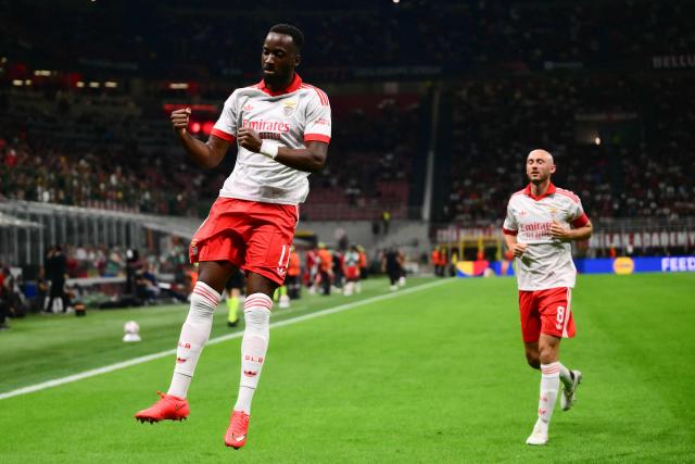 Benfica’s Belgian forward #11 Dodi Lukebakio celebrates after scoring his team's first goal during the UEFA Europa League 1st round day 1 football match between Ac Milan and Benfica at the San Siro Stadium in Milan on September 16, 2026. (Photo by Marco Bertorello / AFP)