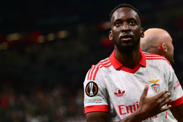 Benfica’s Belgian forward #11 Dodi Lukebakio celebrates after scoring his team's first goal during the UEFA Europa League 1st round day 1 football match between Ac Milan and Benfica at the San Siro Stadium in Milan on September 16, 2026. (Photo by Marco Bertorello / AFP)