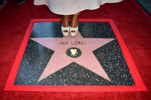 US actress Nia Long stands at her just unveiled star at the Hollywood Walk of Fame during her ceremony in the Hollywood neighborhood of Los Angeles on September 16, 2026. (Photo by Frederic J. BROWN / AFP)
