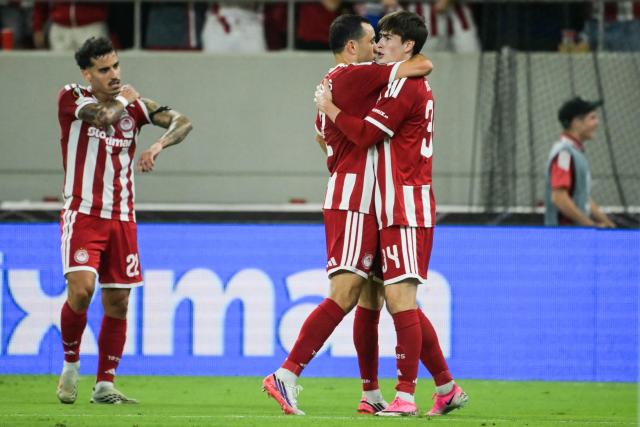 Olympiacos' Mexican forward #34 Armando Gonzalez (R) celebrates with Olympiacos' Greek defender #02 Manolis Saliakas after scoring his team's first goal during the UEFA Europa League first round football match between Olympiacos F.C and Jagiellonia Bialystok at Stadio Georgios Karaiskakis in Athens on September 16, 2026. (Photo by Aris MESSINIS / AFP)