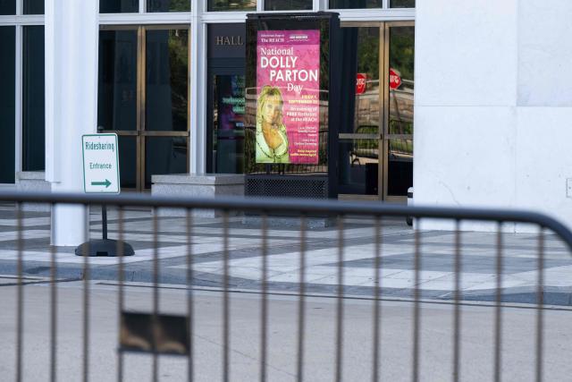 Newly installed fences surround the John F. Kennedy Center for the Performing Arts in Washington, DC, September 16, 2026. US President Donald Trump threatened on September 15 to keep the Kennedy Center closed for good after a judge ruled his name cannot be added onto the famed arts institution's facade. (Photo by SAUL LOEB / AFP)
