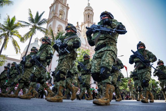 Mexican soldiers march during the Independence Day military parade in Culiacan, state of Sinaloa, Mexico, on September 16, 2026. (Photo by Jesus Verdugo / AFP)