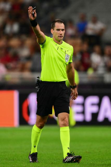 Australian referee Jarred Gillet during the UEFA Europa League 1st round day 1 football match between Ac Milan and Benfica at the San Siro Stadium in Milan on September 16, 2026. (Photo by Marco Bertorello / AFP)