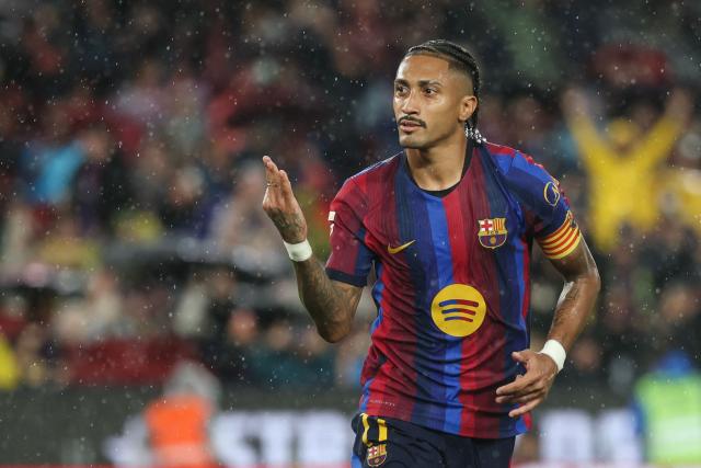 Barcelona's Brazilian forward #11 Raphinha celebrates scoring his team's fifth goal and a hat-trick during the Spanish league football match between FC Barcelona and Racing Santander at the Camp Nou stadium in Barcelona on September 16, 2026. (Photo by Lluis GENE / AFP)