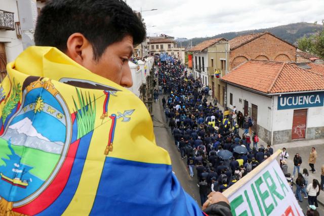 Demonstrators take part in a march in defense of water resources and against mining projects in Cuenca, Ecuador on September 16, 2026. (Photo by Galo Paguay / AFP)