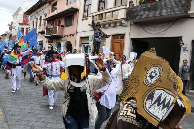 Demonstrators take part in a march in defense of water resources and against mining projects in Cuenca, Ecuador on September 16, 2026. (Photo by Galo Paguay / AFP)
