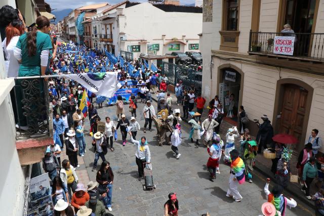 Demonstrators take part in a march in defense of water resources and against mining projects in Cuenca, Ecuador on September 16, 2026. (Photo by Galo Paguay / AFP)