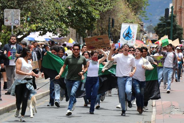 Demonstrators take part in a march in defense of water resources and against mining projects in Cuenca, Ecuador on September 16, 2026. (Photo by Galo Paguay / AFP)