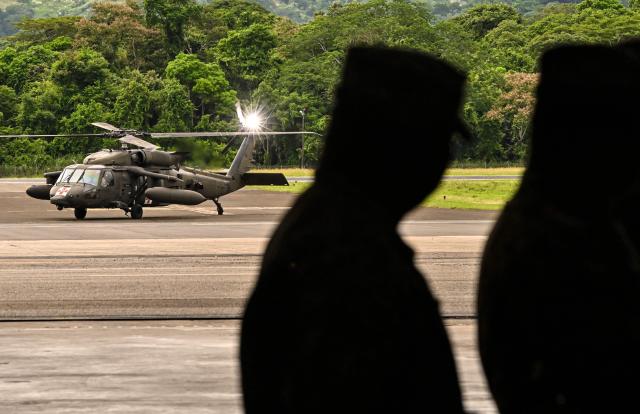 A US Black Hawk helicopter is parked on the runway of the Teniente Octavio Rodriguez Garrido Air Base in Arraijan, Panama on September 16, 2026. (Photo by MARTIN BERNETTI / AFP)