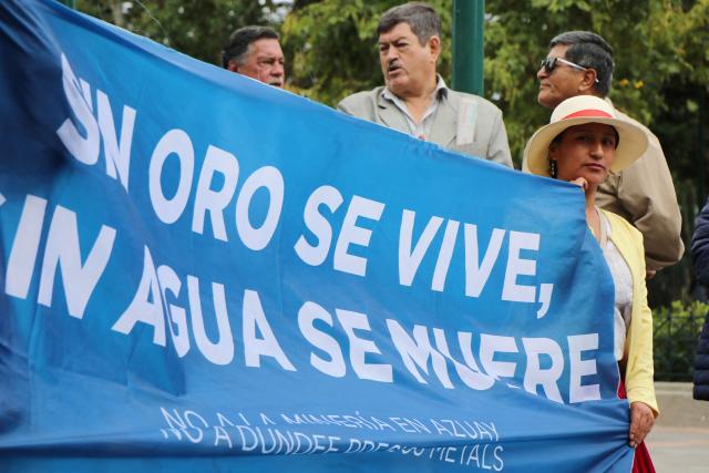Demonstrators take part in a march in defense of water resources and against mining projects in Cuenca, Ecuador on September 16, 2026. (Photo by Galo Paguay / AFP)