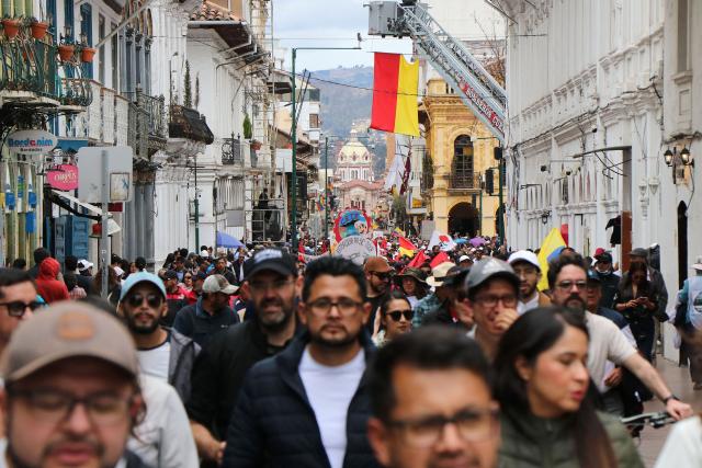 Demonstrators take part in a march in defense of water resources and against mining projects in Cuenca, Ecuador on September 16, 2026. (Photo by Galo Paguay / AFP)