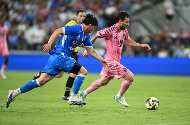 Inter Miami's Argentine forward #10 Lionel Messi and Cruz Azul's midfielder #17 Amaury Garcia fight for the ball during the Campeones Cup final football match between Inter Miami CF and Mexico's Cruz Azul at Nu Stadium in Miami, Florida, on September 16, 2026. (Photo by CHANDAN KHANNA / AFP)