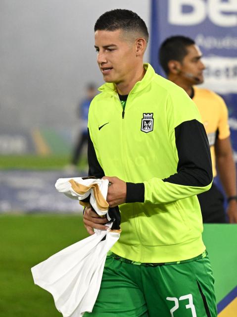 Atletico Nacional midfielder #23 James Rodriguez gestures ahead of the Colombian first division football match between Internacional Bogota and Atletico Nacional at El Campin stadium in Bogota on September 16, 2026. James will play for a Colombian football side after 18 years overseas. (Photo by Raul ARBOLEDA / AFP)