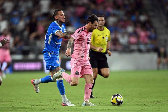 Inter Miami's Argentine forward #10 Lionel Messi runs with the ball chased by Cruz Azul's Argentine defender #33 Gonzalo Piovi during the Campeones Cup final football match between Inter Miami CF and Mexico's Cruz Azul at Nu Stadium in Miami, Florida, on September 16, 2026. (Photo by CHANDAN KHANNA / AFP)