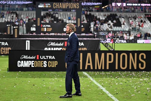 Inter Miami's co-owner David Beckham watches as his team celebrates defeating Mexico's Cruz Azul in the Campeones Cup final at Nu Stadium in Miami, Florida, on September 16, 2026. (Photo by CHANDAN KHANNA / AFP)