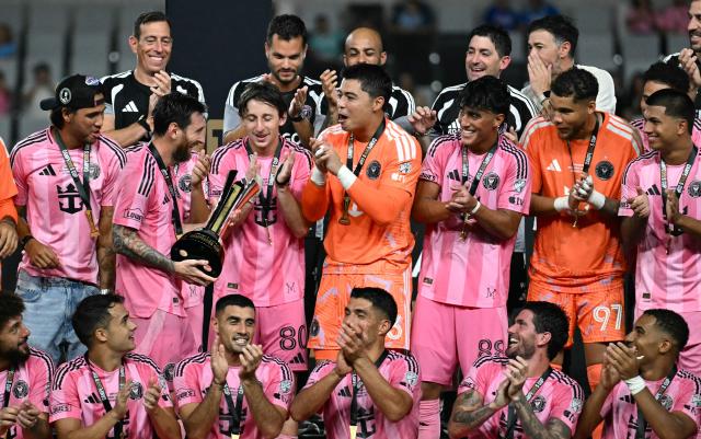 Inter Miami's Argentine forward #10 Lionel Messi holds up the trophy with teammates after his team defeated Mexico's Cruz Azul in the Campeones Cup final at Nu Stadium in Miami, Florida, on September 16, 2026. (Photo by CHANDAN KHANNA / AFP)