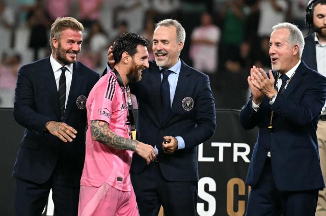 Inter Miami's co-owners David Beckham, Jorge Mas (C) and Jose Mas (R) congratulate Argentine forward #10 Lionel Messi after their team defeated Mexico's Cruz Azul in the Campeones Cup final at Nu Stadium in Miami, Florida, on September 16, 2026. (Photo by CHANDAN KHANNA / AFP)