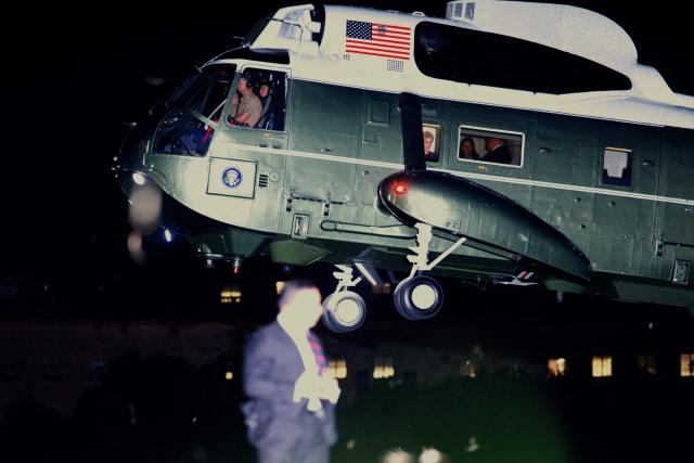 US President Donald Trump, aboard Marine One, arrives on the Ellipse near the White House in Washington, DC on September 16, 2026. Trump is returning from Gastonia, North Carolina after campaigning for Republican US Senate candidate Michael Whatley. (Photo by Kent Nishimura / AFP)