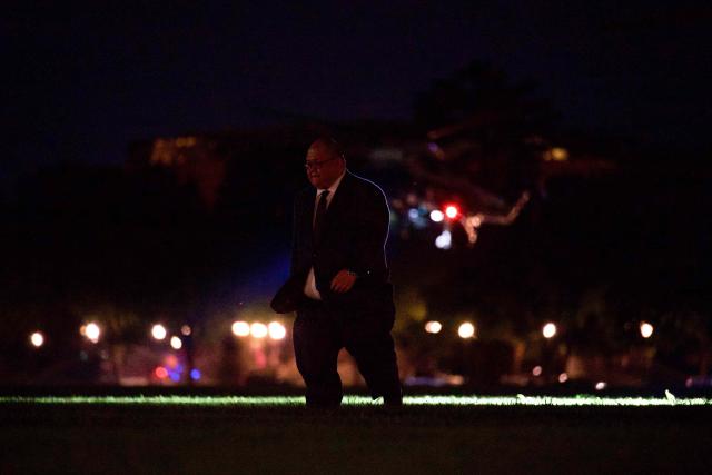 White House Communications Director Steven Cheung walks across the Ellipse after disembarking as Marine One, carrying US President Donald Trump, lands on the Ellipse near the White House in Washington, DC on September 16, 2026. Trump is returning from Gastonia, North Carolina after campaigning for Republican US Senate candidate Michael Whatley. (Photo by Kent Nishimura / AFP)
