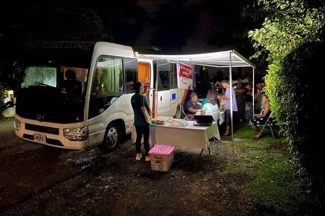 (FILES) This picture taken on March 19, 2026 shows a Medical Services Pacific Moonlight programme team offering free HIV testing during an outreach visit to a suburb of Suva. Fiji has declared a national HIV crisis as sexual transmission and illicit drug use help to spread the virus, now infecting an estimated one in 60 adults in the Pacific nation. "I am formally declaring a national HIV emergency in Fiji," Health Minister Atonio Lalabalavu told reporters on September 17, 2026. (Photo by AFP)