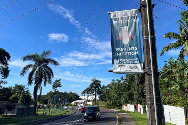 (FILES) This picture taken on April 20, 2026 shows an HIV awareness poster displayed along a main road in Suva, as health authorities and aid agencies step up public messaging amid a surge in HIV cases in Fiji. Fiji has declared a national HIV crisis as sexual transmission and illicit drug use help to spread the virus, now infecting an estimated one in 60 adults in the Pacific nation. "I am formally declaring a national HIV emergency in Fiji," Health Minister Atonio Lalabalavu told reporters on September 17, 2026. (Photo by AFP)