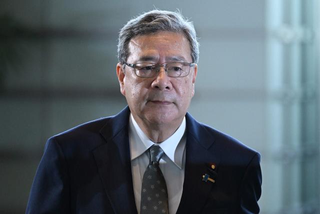 Newly-appointed Japanese Minister of State for Regulatory Reform Hiroshi Nakatuska arrives at the prime minister’s office in Tokyo on September 17, 2026, ahead of an expected cabinet reshuffle. (Photo by Rie KIKUCHI / AFP)