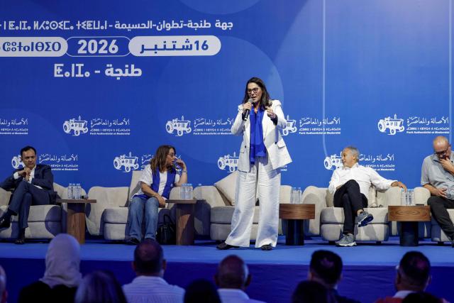Secretary General of the Authenticity and Modernity Party (PAM) Fatima Ezzahra El Mansouri (C), who is also Morocco's Minister of National Planning, Urban Planning, Housing and Urban Policy and Mayor of Marrakesh, speaks during a party rally in Tangier on September 16, 2026, as part of PAM's electoral campaign ahead of Morocco's legislative elections, scheduled for September 23. Campaigning for Morocco's legislative election opened on September 10, with the governing coalition seeking to retain power amid discontent over economic and regional inequalities. The disparities are set to be a major issue in the vote, which will be held days before the first anniversary of a youth-led protest movement. (Photo by Abdel Majid BZIOUAT / AFP)