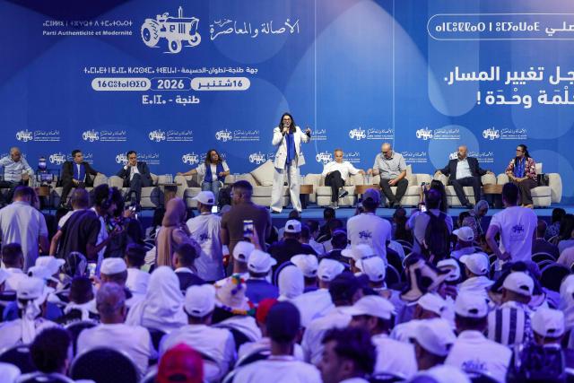 Secretary General of the Authenticity and Modernity Party (PAM) Fatima Ezzahra El Mansouri (C), who is also Morocco's Minister of National Planning, Urban Planning, Housing and Urban Policy and Mayor of Marrakesh, speaks during a party rally in Tangier on September 16, 2026, as part of PAM's electoral campaign ahead of Morocco's legislative elections, scheduled for September 23. Campaigning for Morocco's legislative election opened on September 10, with the governing coalition seeking to retain power amid discontent over economic and regional inequalities. The disparities are set to be a major issue in the vote, which will be held days before the first anniversary of a youth-led protest movement. (Photo by Abdel Majid BZIOUAT / AFP)