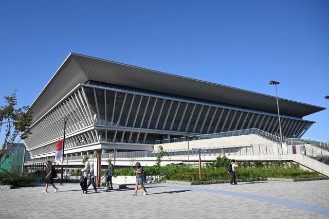 A general view shows the exterior of the Tokyo Aquatics Centre ahead of the 2026 Asian Games in Tokyo on September 17, 2026. (Photo by ANDREW CABALLERO-REYNOLDS / AFP)
