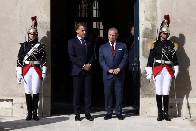 French President Emmanuel Macron (C,L) and Jordan's King Abdullah II (C,R) wait for the arrival of the Lebanese president before a trilateral meeting ahead of the opening of the "Aqaba Process" meeting in support of the Lebanese Armed Forces (LAF), at Hotel des Invalides in Paris, on September 17, 2026. The leaders of France, Lebanon and Jordan on September 17, 2026 met in  Paris to discuss international support for the cash-strapped Lebanese army and the creation of a new force to succeed a longstanding UN peacekeeping mission in southern Lebanon. (Photo by Gonzalo Fuentes / POOL / AFP)