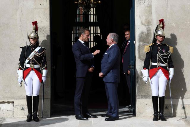 French President Emmanuel Macron (C,L) and Jordan's King Abdullah II (C,R) wait for the arrival of the Lebanese president before a trilateral meeting ahead of the opening of the "Aqaba Process" meeting in support of the Lebanese Armed Forces (LAF), at Hotel des Invalides in Paris, on September 17, 2026. The leaders of France, Lebanon and Jordan on September 17, 2026 met in  Paris to discuss international support for the cash-strapped Lebanese army and the creation of a new force to succeed a longstanding UN peacekeeping mission in southern Lebanon. (Photo by Gonzalo Fuentes / POOL / AFP)