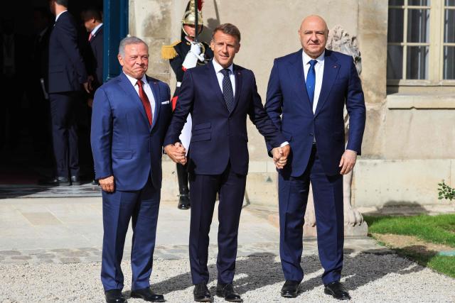 (From L) Jordan's King Abdullah II, France's President Emmanuel Macron and Lebanon's President Joseph Aoun pose before a meeting of the Aqaba process in support of the Lebanese armed forces at the Hotel des Invalides in Paris on September 17, 2026. (Photo by Ludovic MARIN / AFP)