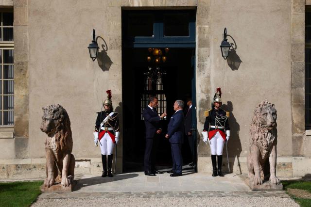 French President Emmanuel Macron (C,L) and Jordan's King Abdullah II (C,R) wait for the arrival of the Lebanese president before a trilateral meeting ahead of the opening of the "Aqaba Process" meeting in support of the Lebanese Armed Forces (LAF), at Hotel des Invalides in Paris, on September 17, 2026. The leaders of France, Lebanon and Jordan on September 17, 2026 met in  Paris to discuss international support for the cash-strapped Lebanese army and the creation of a new force to succeed a longstanding UN peacekeeping mission in southern Lebanon. (Photo by Gonzalo Fuentes / POOL / AFP)