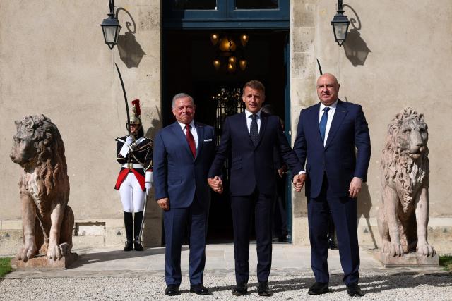 French President Emmanuel Macron (C), Jordan's King Abdullah II (L) and Lebanese President Joseph Aoun (R) pose before a trilateral meeting ahead of the opening of the "Aqaba Process" meeting in support of the Lebanese Armed Forces (LAF), at Hotel des Invalides in Paris, on September 17, 2026. The leaders of France, Lebanon and Jordan on September 17, 2026 met in  Paris to discuss international support for the cash-strapped Lebanese army and the creation of a new force to succeed a longstanding UN peacekeeping mission in southern Lebanon. (Photo by Gonzalo Fuentes / POOL / AFP)