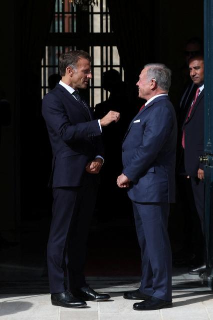 French President Emmanuel Macron (L) and Jordan's King Abdullah II (R) wait for the arrival of the Lebanese president before a trilateral meeting ahead of the opening of the "Aqaba Process" meeting in support of the Lebanese Armed Forces (LAF), at Hotel des Invalides in Paris, on September 17, 2026. The leaders of France, Lebanon and Jordan on September 17, 2026 met in  Paris to discuss international support for the cash-strapped Lebanese army and the creation of a new force to succeed a longstanding UN peacekeeping mission in southern Lebanon. (Photo by Gonzalo Fuentes / POOL / AFP)