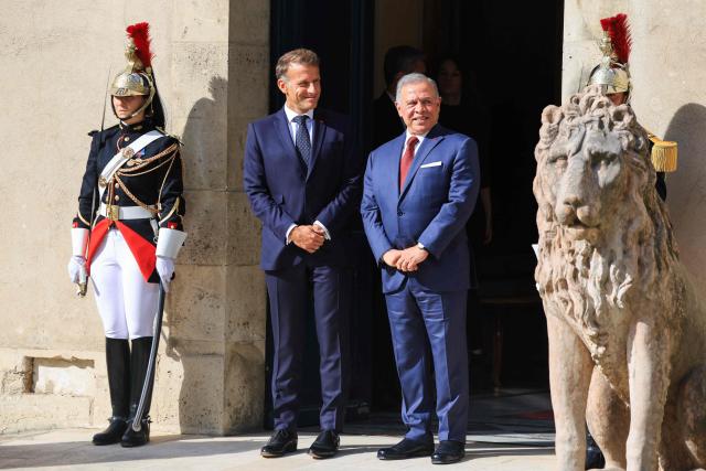 Jordan's King Abdullah II (R) speaks with France's President Emmanuel Macron before a meeting of the Aqaba process in support of the Lebanese armed forces at the Hotel des Invalides in Paris on September 17, 2026. (Photo by Ludovic MARIN / AFP)