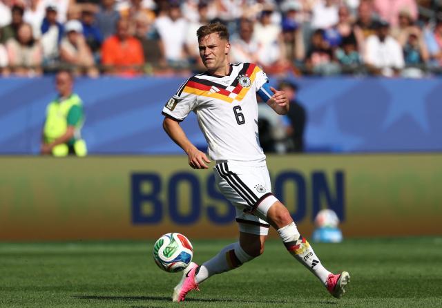 (FILES) Germany's defender #06 Joshua Kimmich controls the ball during the 2026 World Cup round of 32 football match between Germany and Paraguay at the Boston Stadium in Foxborough on June 29, 2026. Germany coach Jurgen Klopp handed 16 players their first call-ups on September 17, 2026 as he unveiled a 44-man squad for his first camp since taking over as coach in the summer. Bayern midfielder Joshua Kimmich, the most experienced member of the squad with 114 caps, has retained the captain's armband. The 31-year-old is set to move from right-back to central midfield, where he plays at club level. (Photo by FRANCK FIFE / AFP)