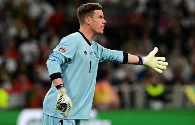(FILES) Germany's goalkeeper #01 Marc-Andre Ter Stegen reacts during the UEFA Nations League semi-final football match between Germany and Portugal in Munich, southern Germany on June 4, 2025. Germany coach Jurgen Klopp handed 16 players their first call-ups on September 17, 2026 as he unveiled a 44-man squad for his first camp since taking over as coach in the summer. Marc-Andre ter Stegen will be Germany's number one option in goal. Ter Stegen left Barcelona for Ajax on a season-long loan in the summer after a torrid run of injuries which restricted him to just 12 competitive matches in the past two years. (Photo by Tobias SCHWARZ / AFP)