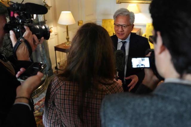 Nvidia chief executive Jensen Huang (C) records a pool interview ahead of a conference hosted by Britain's King Charles III for leaders from the artificial intelligence (AI) sector and government, at Dumfries House in Cumnock, Scotland on September 17, 2026. The king was to expected to urge tech giants to ensure that artificial intelligence is geared to serve humanity and that mankind does "not lose control". (Photo by Jonathan Brady / POOL / AFP)