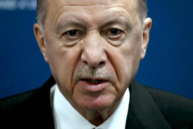 (FILES) Turkey's President Recep Tayyip Erdogan gives a press conference during the G20 Leaders' Meeting in Rio de Janeiro, Brazil, on November 19, 2024. A top adviser to Recep Tayyip Erdogan said the Turkish leader would run again in an early election likely to be held in April 2028, media outlets reported on September 17, 2026. (Photo by Luis ROBAYO / AFP)